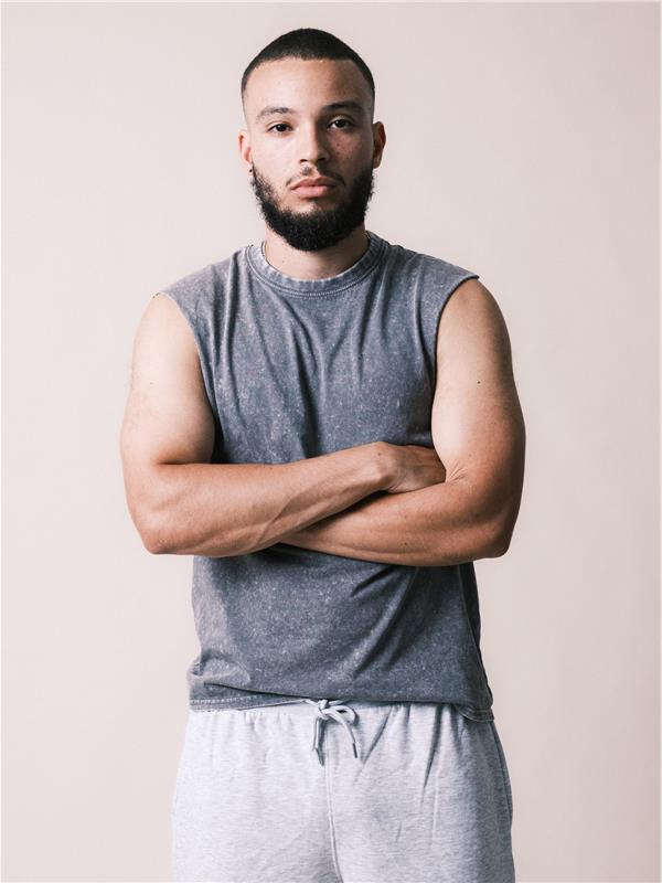 Model wearing CRBVAC600 acid charcoal raw edge droparm tank